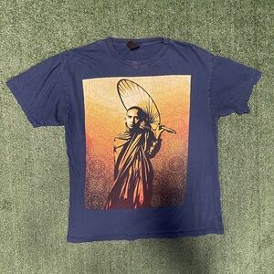 Cato Blue Graphic Tee with Orange and Yellow Design